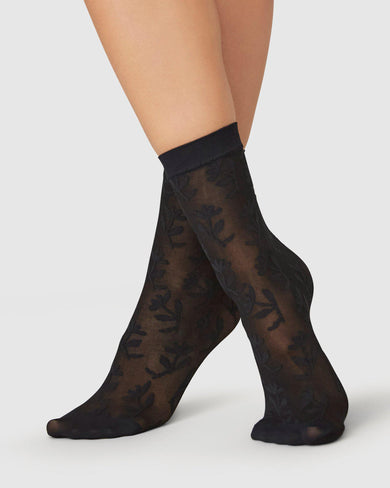 182032001-flora-flower-socks-black-swedish-stockings-3