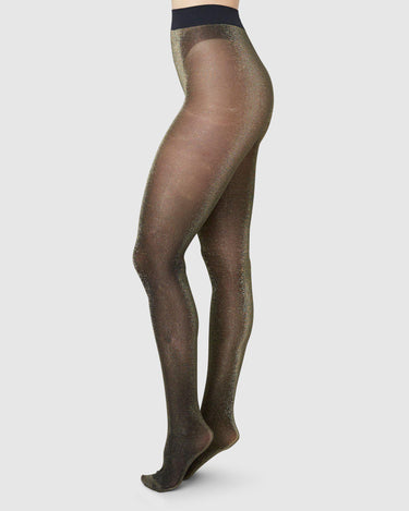 113017009-tora-shimmery-tights-black-gold-swedish-stockings-1