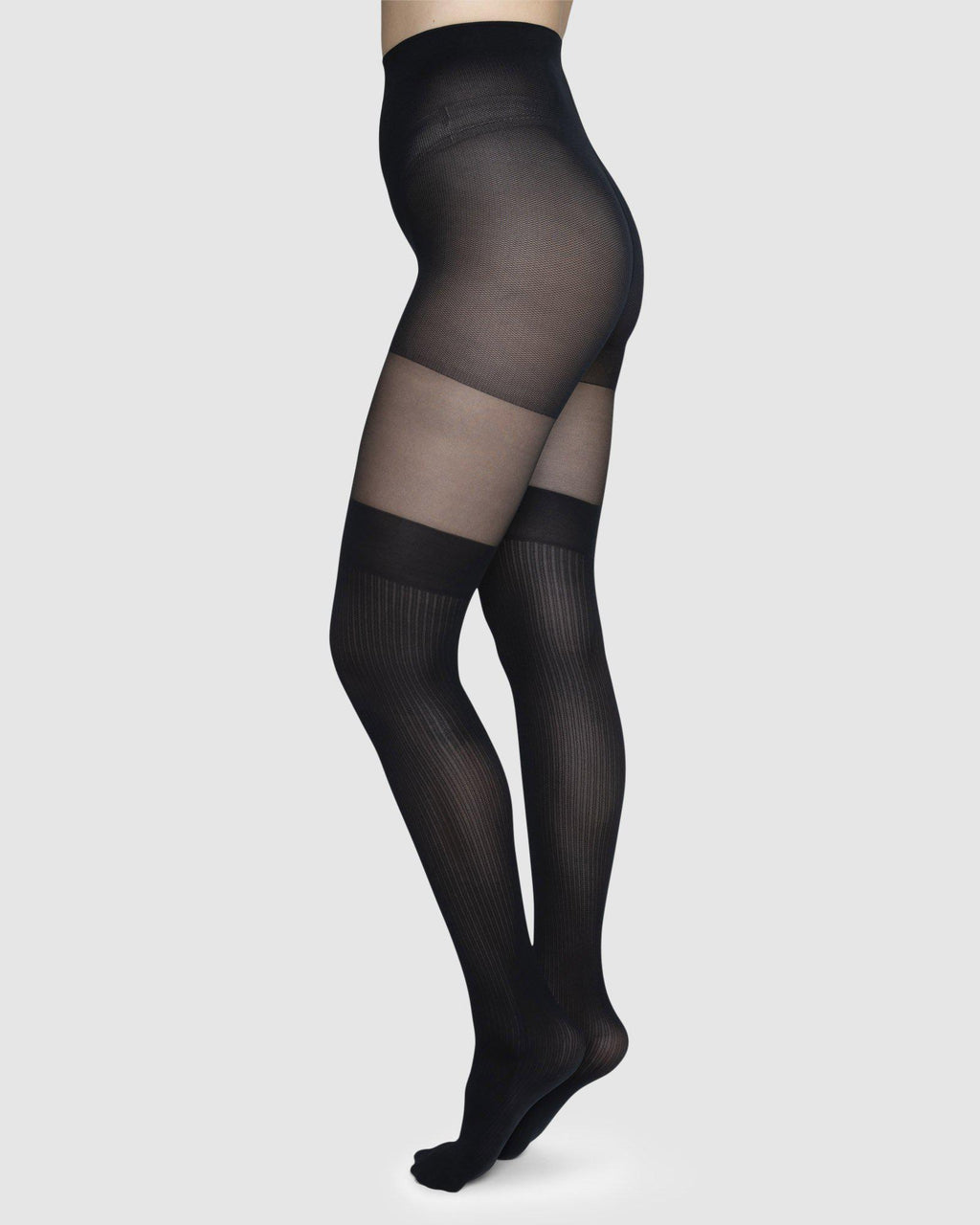 https://swedishstockings.com/cdn/shop/products/111011001-dagmar-over-knee-tights-black-swedish-stockings-1_8baf824a-b765-456a-948b-adc9e17cd047_1024x.jpg?v=1680192931